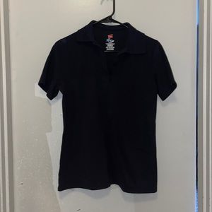 Short sleeved, black polo.
